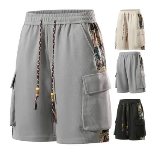 Shorts bordados de cinco puntos de talla grande.