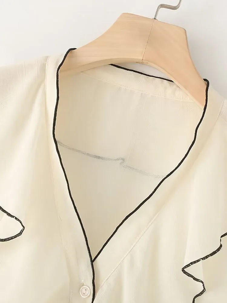 Camisa de manga larga con volantes y cuello en V en capas. - Image 2