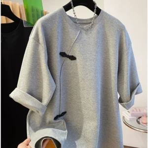 Camiseta, Corta Holgada Cuello Redondo Botones.