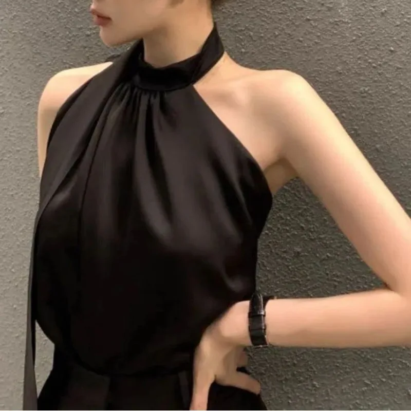 Blusas elegantes sin mangas con cuello Halter Irregular empalmado y hombros descubiertos.