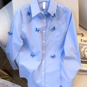 Camisas holgada, manga larga.