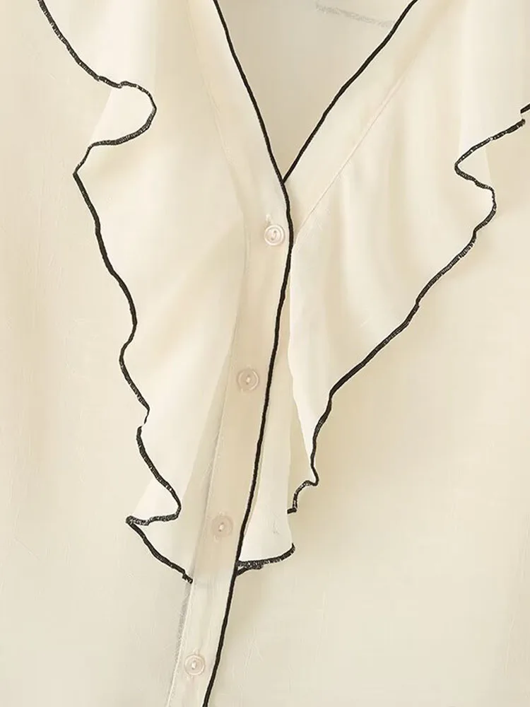 Camisa de manga larga con volantes y cuello en V en capas. - Image 3