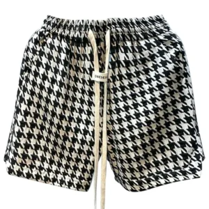 Shorts de cintura elástica,holgados, con estampado a cuadros y bolsillos, con cordón.