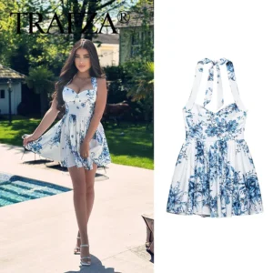 Vestido corto, estampado blanco y azul, con cremallera.