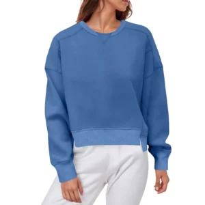 Camisetas sencillas de manga larga, holgada de cuello redondo.