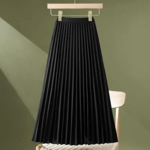 Falda de talla grande, de cintura alta, longitud media.