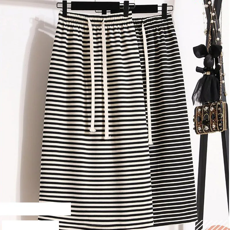 Faldas largas, elástico.