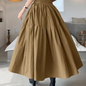 Falda larga de cintura alta, con cremallera, holgada acampanada.