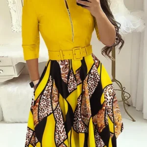 Vestido manga larga con cuello redondo con estampado de rayas.