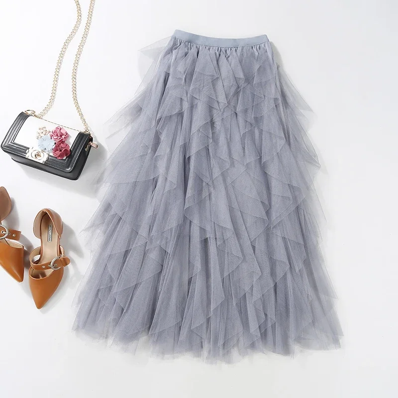 Falda de cintura alta elástica, por debajo de la rodilla. - Image 3